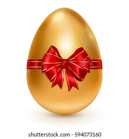 Realistic golden Easter egg tied of red ribbon with a big bow on white background