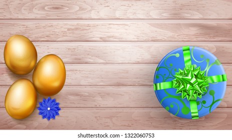 Realistic golden Easter eggs and beautiful gift box with bow on wooden planks