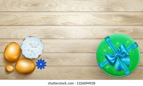 Realistic golden Easter eggs, tasty cake and beautiful gift box with bow on wooden planks