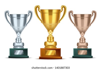 Realistic Golden, silver and bronze Trophy with text plate for champions. Sport winners cup. Vector Illustration
