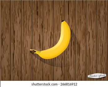 realistic graphic design vector of banana on wood table
