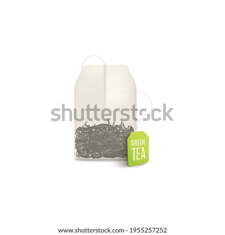 Realistic green tea bag with dried leaves and green label tag