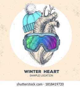 Dibujo manual realista ilustración vectorial del corazón humano en sombrero de invierno y gafas de snowboard