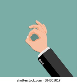 The realistic hand with a suit sleeve showing gesture ok. A vector illustration in flat style.