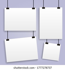Realistic hanging blank paper sheet with shadow in A4 format and black paper clip. Design poster, template or mockup. Vector illustration 