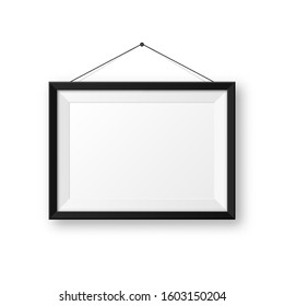 Realistic hanging on a wall blank black picture frame with shadow. Modern poster mockup isolated on white background. Empty photo frame for art gallery or interior. Vector illustration.