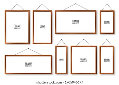 Realistic hanging on a wall blank wooden picture frames set. Modern poster mockup. Empty photo frame with texture of wood. Vector illustration.