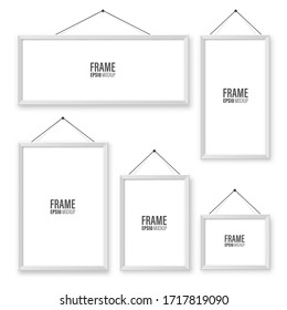 Realistic hanging on a wall white blank picture frames collection. Modern poster mockup. Empty photo frame. Vector illustration.
