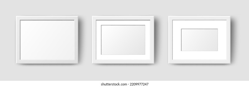 Realistic Horizontal Rectangle Empty Wall Photo Frames set. Vector white picture frame mockup template with shadow on grey background. Mockup for poster, banner, photo gallery, painting, presentation.