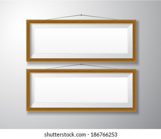 Realistic horizontal wooden picture frames with empty space isolated on white background for presentation and showcasing purposes.