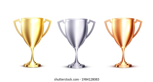 Realistic icon with gold, silver and bronze trophy on white background. Realistic 3d design. Championship trophy. Sport award set.