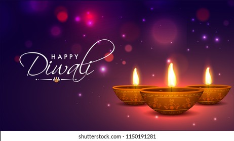 Realistic, Illuminated Oil Lamps on shiny bokeh background for Indian Festival of Diwali celebration.