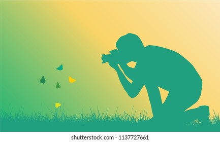 Realistic illustration of a young man photographing flying butterflies in a lawn - vector