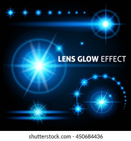 Realistic lens flares and rays flash white light on a dark background. Vector illustrations