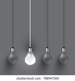Realistic light bulbs on black background, vector illustration