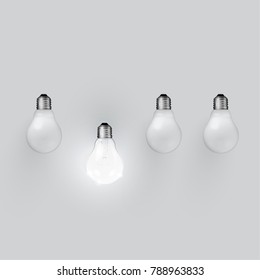 Realistic light bulbs on grey background, vector illustration