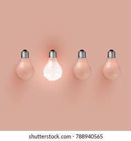 Realistic light bulbs on orange background, vector illustration