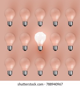 Realistic light bulbs on orange background, vector illustration