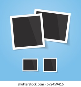 Realistic looking photo frames, isolated on blue background, vector illustration. Easy to use for your design with transparent shadows.