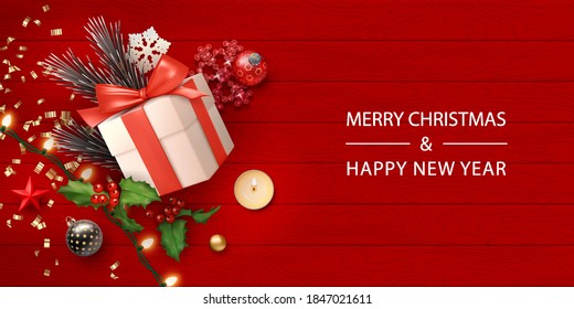 Realistic Merry Christmas banner template with gift box and Christmas decorations