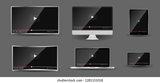 Realistic modern digital devices isolated on grey background. PC, TV, smartphone, laptop, tablet. Classic video player template on screen. Online video watching conecpt. Vector illustration