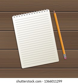 Realistic notebook and pen on wooden background vector design illustration