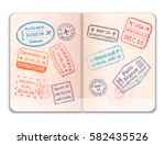 Realistic open foreign passport with many immigration stamps isolated on white