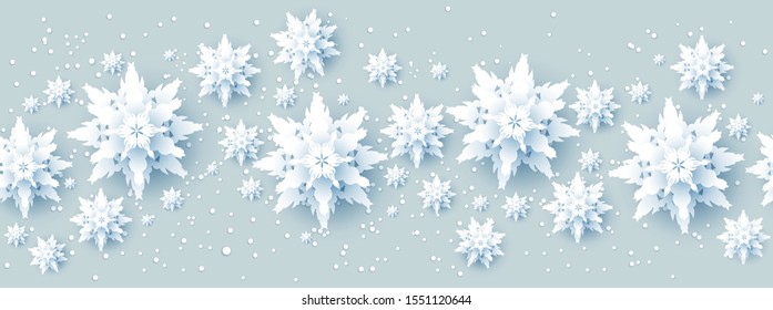 Realistic paper cut snowflakes banner