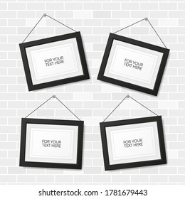 Realistic picture frame set isolated on white brick background. For your text here. Vector illustration.
