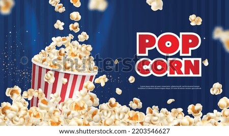 Realistic popcorn poster with flakes falling to bucket on blue background vector illustration