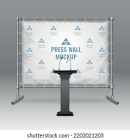 Realistic press wall mockup behind speech tribune with microphones on grey background vector illustration