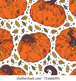 Realistic pumpkins and leaves autumn seamless pattern.