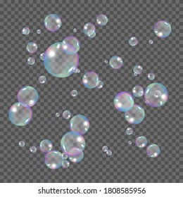 Realistic rainbow color bubbles. Soap bubbles isolated on transparent background. Vector