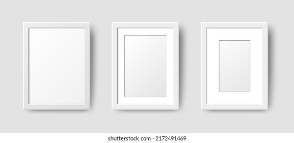 Realistische Rectangle Leere Wall-Fotorahmen setzen. Vertikal-weißer Bildrahmen mit Schatten auf grauem Hintergrund. Für Poster, Banner, Fotogalerie, Malerei, Präsentation.