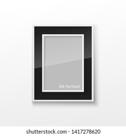 Realistic Rectangular Black and White Blank Picture Frame A3, A4 sizes, hanging on a White Wall from the Front. Vector illustration Empty Frame with Shiny Glass. Design Template for Mock Up.