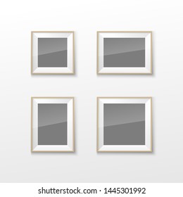 Realistic Rectangular Square wood Brown Color Blank Picture Frame A3, A4 sizes, hanging on a White Wall from the Front. illustration Empty wood Frame with Shiny Glass. Design Template for Mock Up.