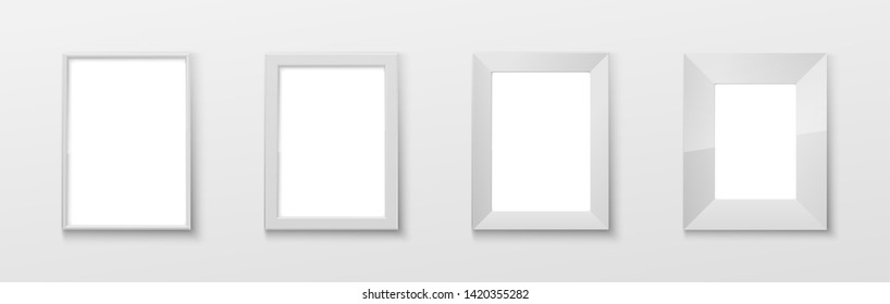 Realistic Rectangular White Color Blank Picture Frame A3, A4 sizes, hanging on a White Wall from the Front. illustration set Empty Frame with Shiny Glass. Design Template for Mock Up Set