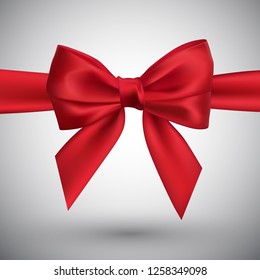 Realistic red bow. Element for decoration gifts, greetings, holidays. Vector illustration.