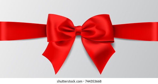 Realistic red bow isolated on white background