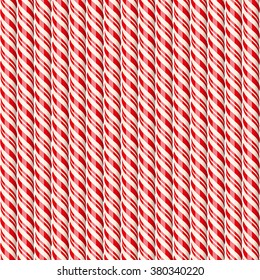 Realistic red candy canes. Seamless pattern