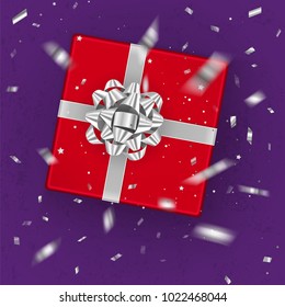 A realistic red gift box decorated with a silver bow, top view. Vector illustration