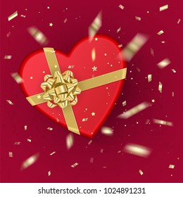 A realistic red gift box with shape of heart decorated with a gold bow, top view. Vector illustration