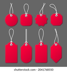 Realistic red price tags with white string on gray background. Special offer or shopping discount label. Retail paper sticker. Promotional sale badge. Vector illustration.