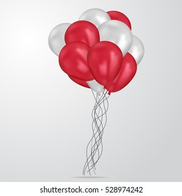 Realistic red and white birthday balloons flying for party or celebrations. Space for message. Isolated on light background.