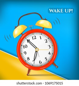 Realistic red yellow alarm clock isolated on blue wood planks texture, background, text Wake Up
