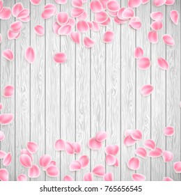 Realistic Sakura petals on a white wooden background, Valentines day template. And also includes EPS 10 vector