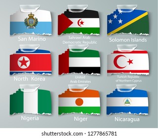 realistic set of flags of paper of countries with tapes ripped