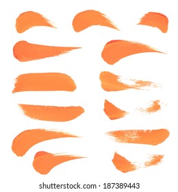 Realistic short strokes thick orange paint on a white surface 1. Vector drawing