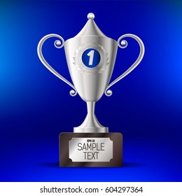 Realistic silver cup for first place On a blue background