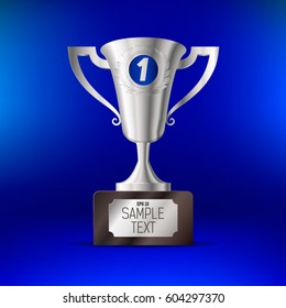 Realistic silver cup for first place On a blue background